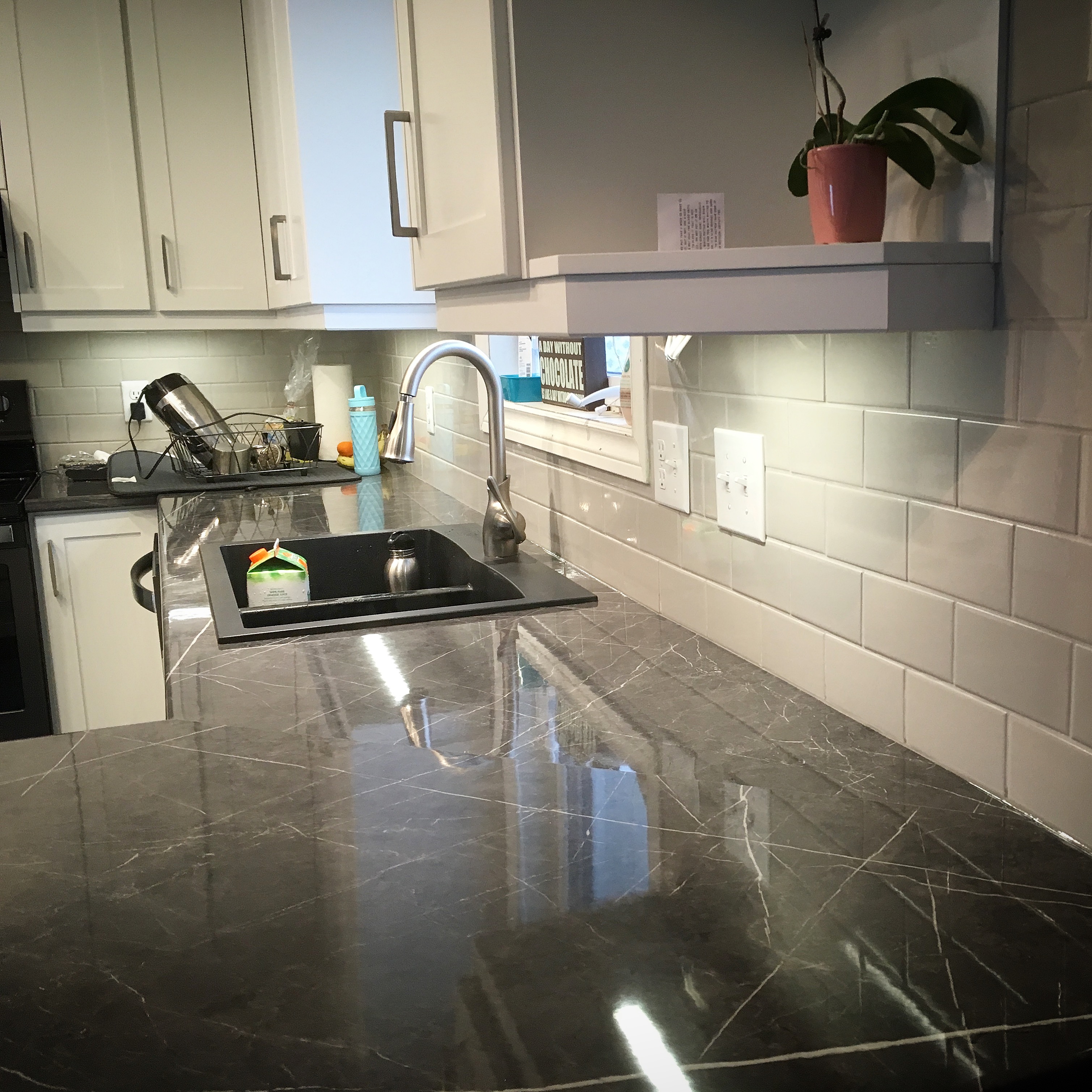 Postform laminate with granite sink and tile backsplash