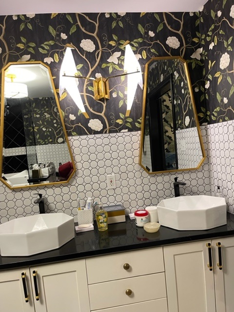A unique new bathroom with black Quartz from Cambria and a complementing backsplash tile