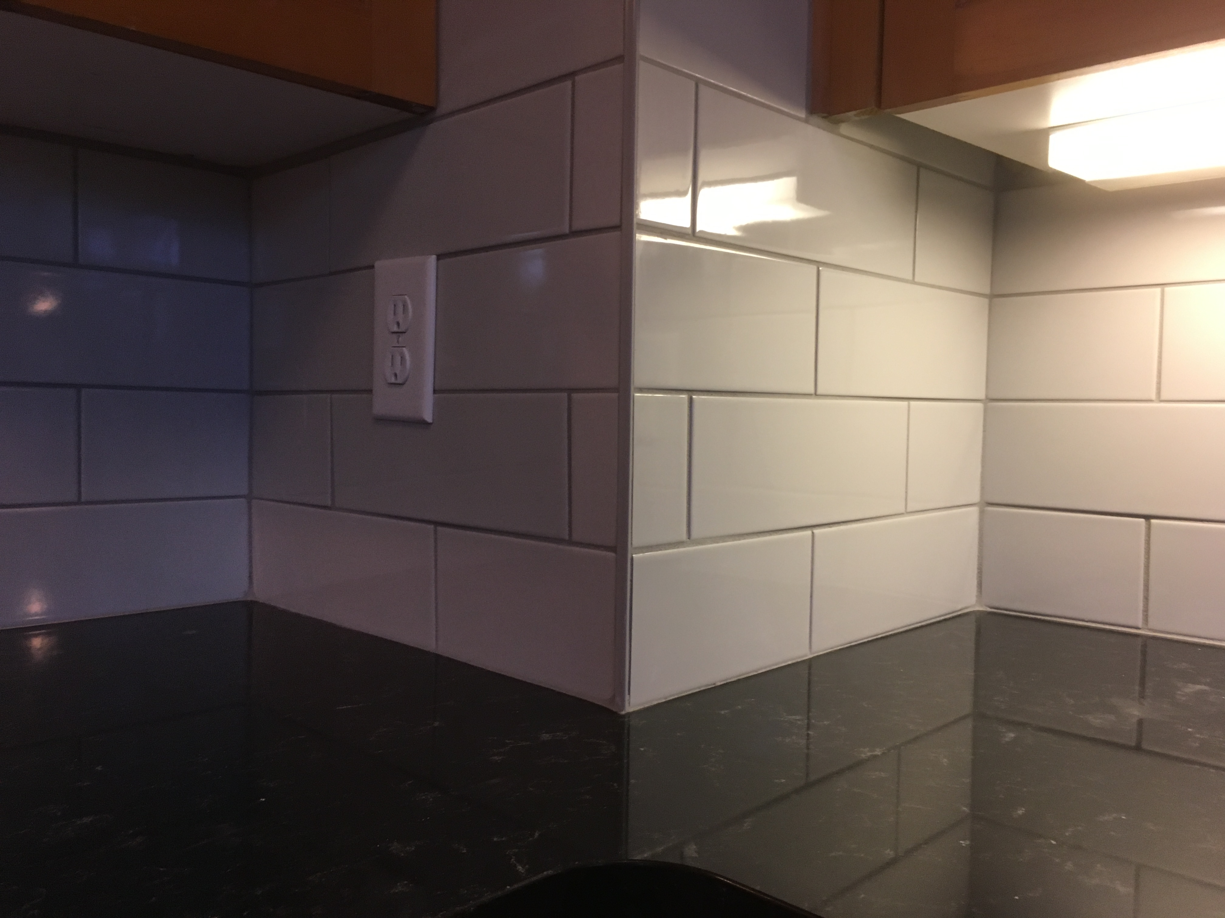 Quartz counter with tile backsplash