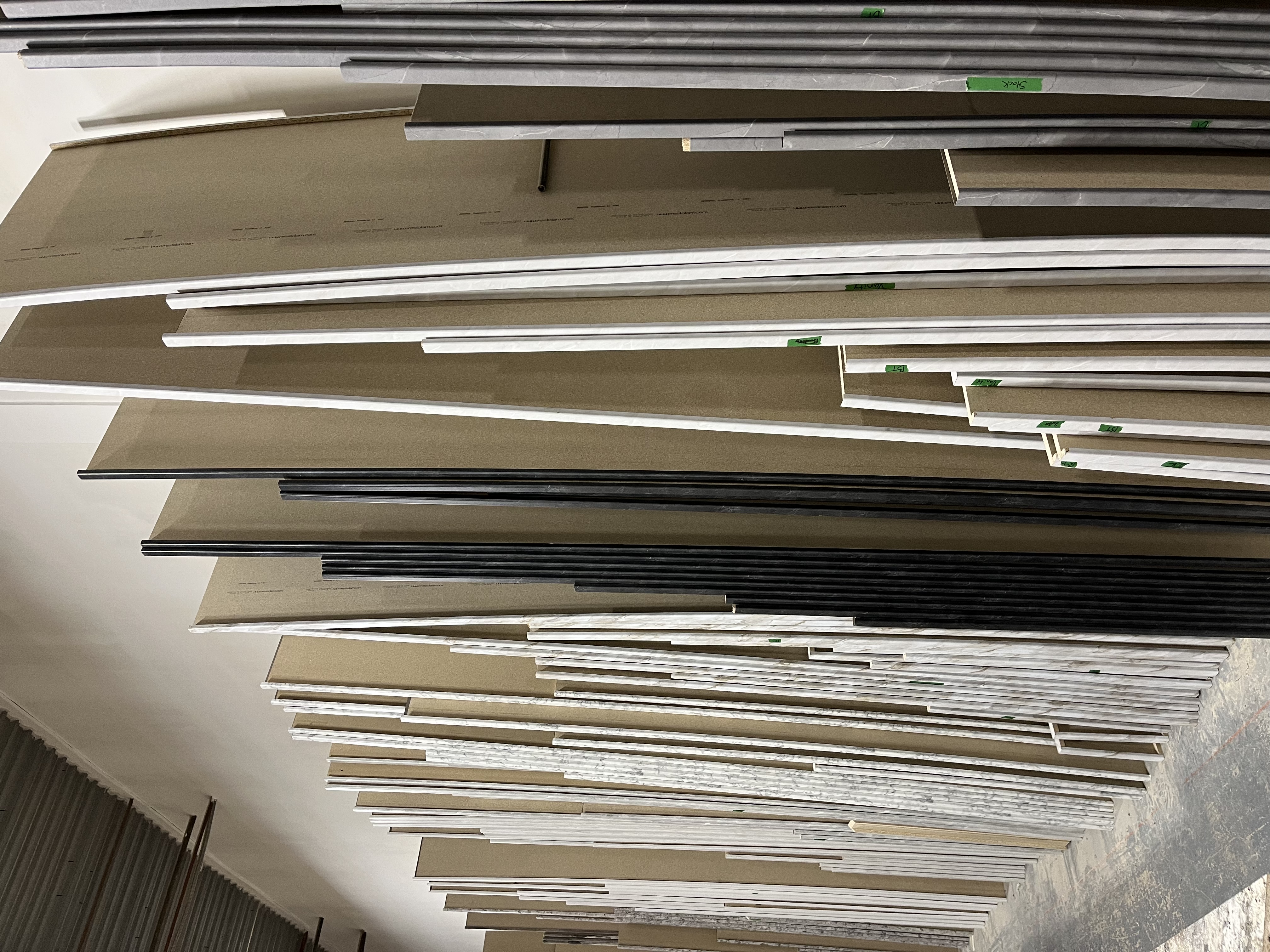 A view of some of our stock Postform Laminate runs all in a row 
