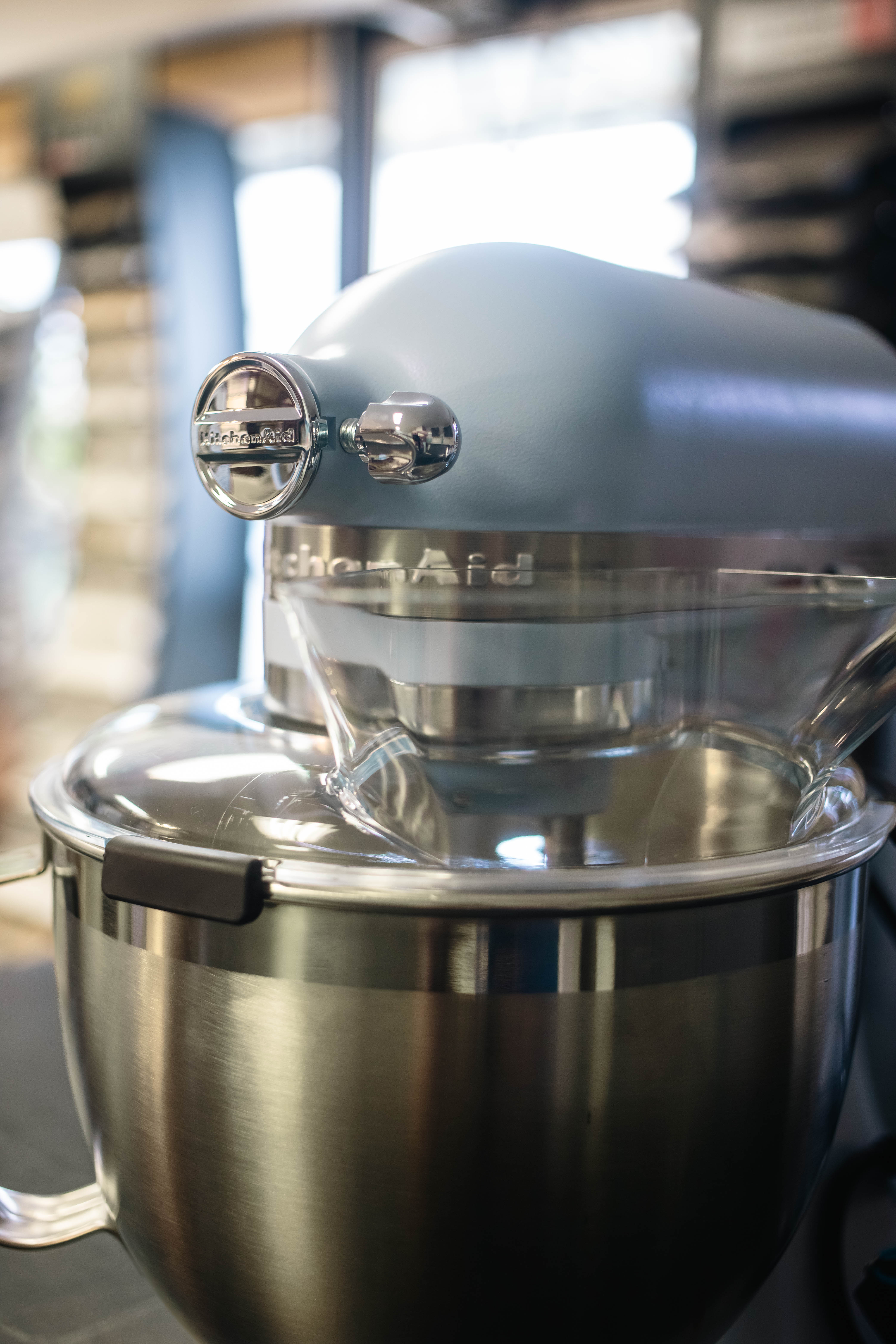 A close up of the 2024 KitchenAid stand up mixer in the colour of the year “Blue Salt"
